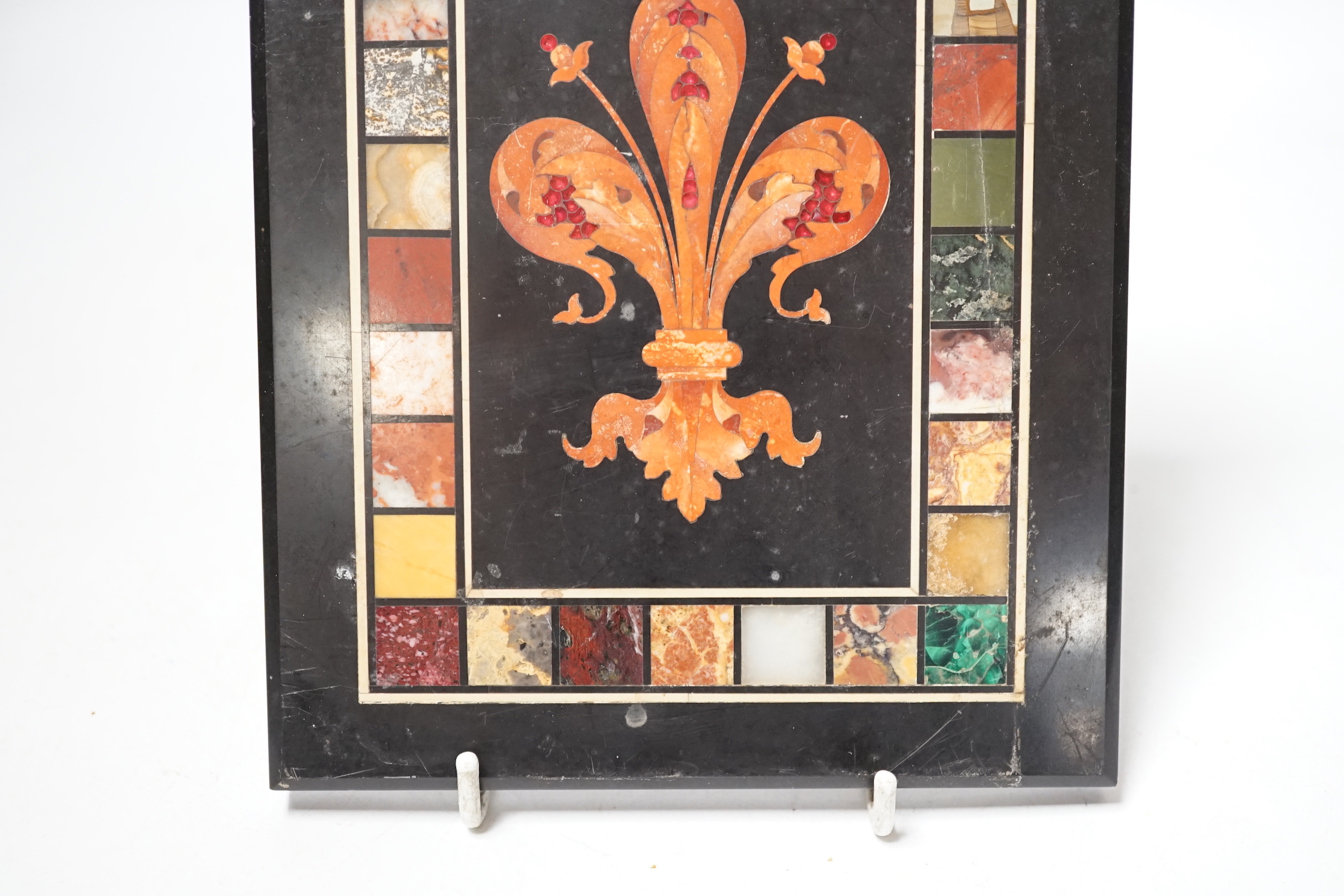 An Italian pietra dura ‘fleur de lys’ plaque, 20x15.5cm